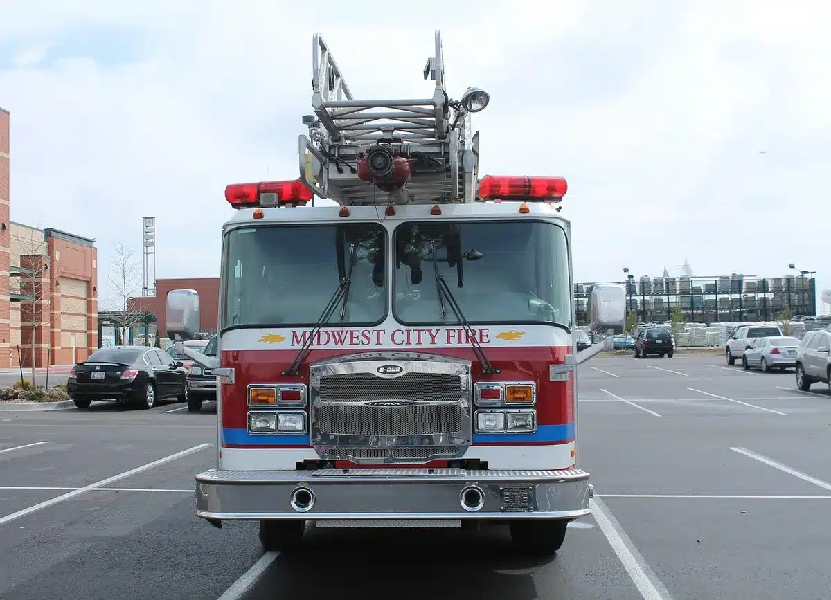 Silhouette of firefighter costume and ladder truck on a studio lot