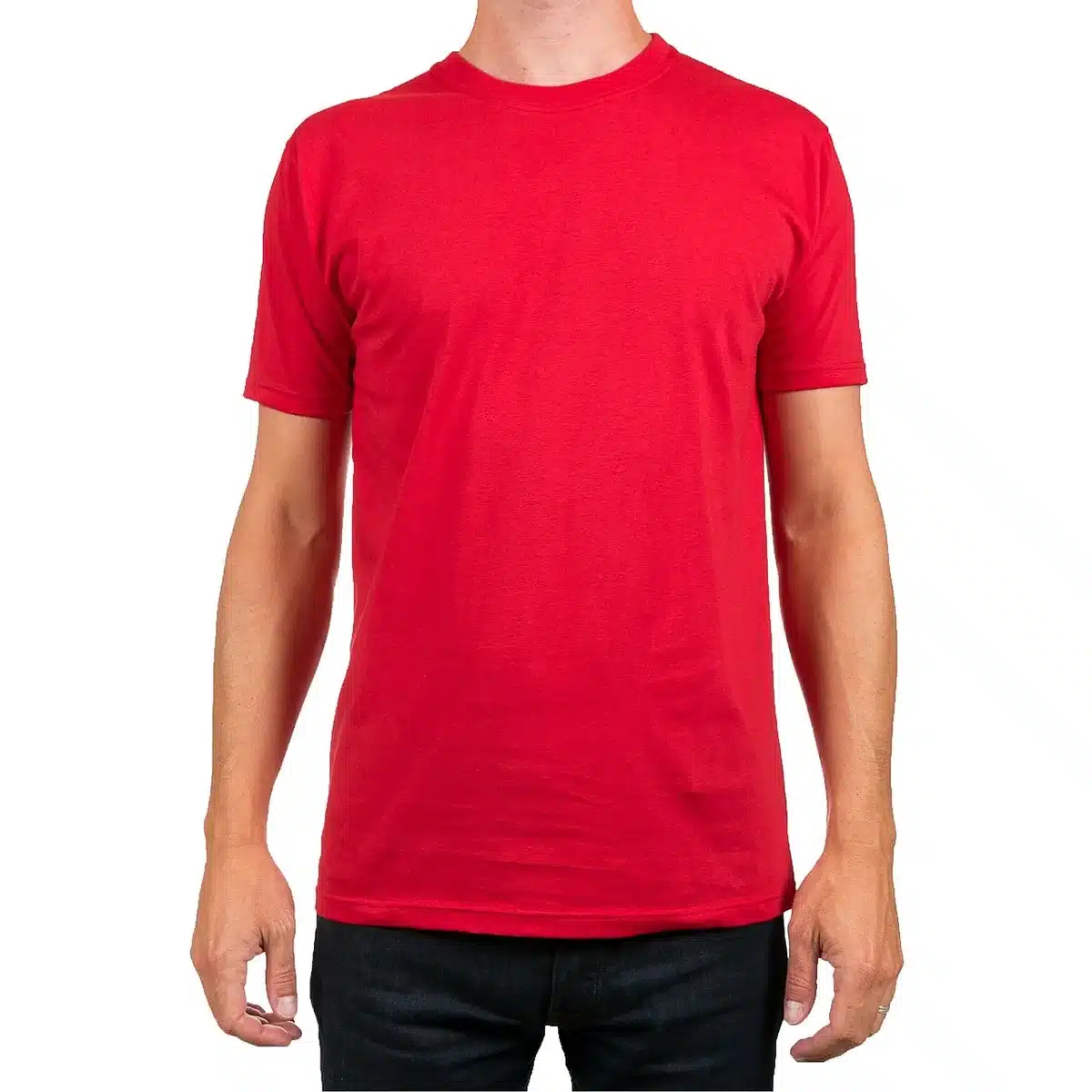 Person in oversized baby-style T-shirt and relaxed jeans moving at home (anonymous)