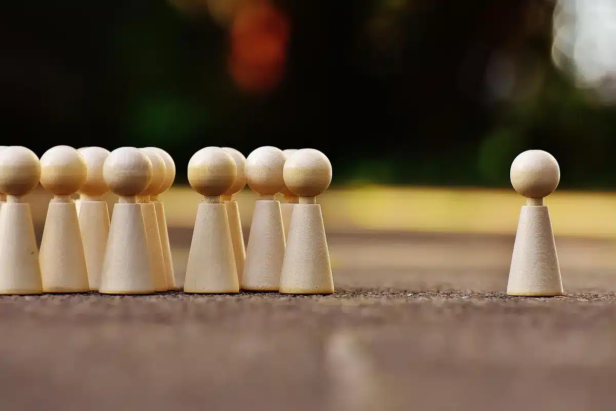 Anonymous group around a table in heated discussion during a game