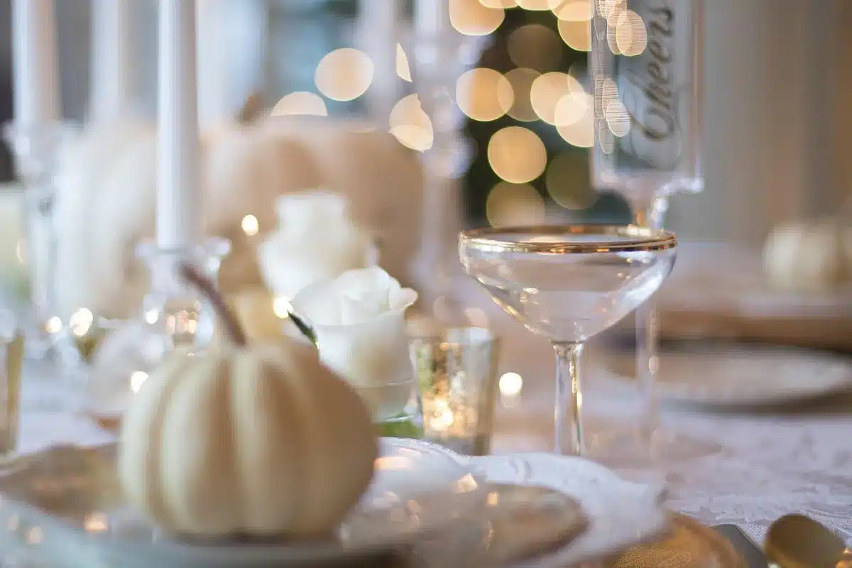 Elegant 1990s-style dinner with guests by a fireplace