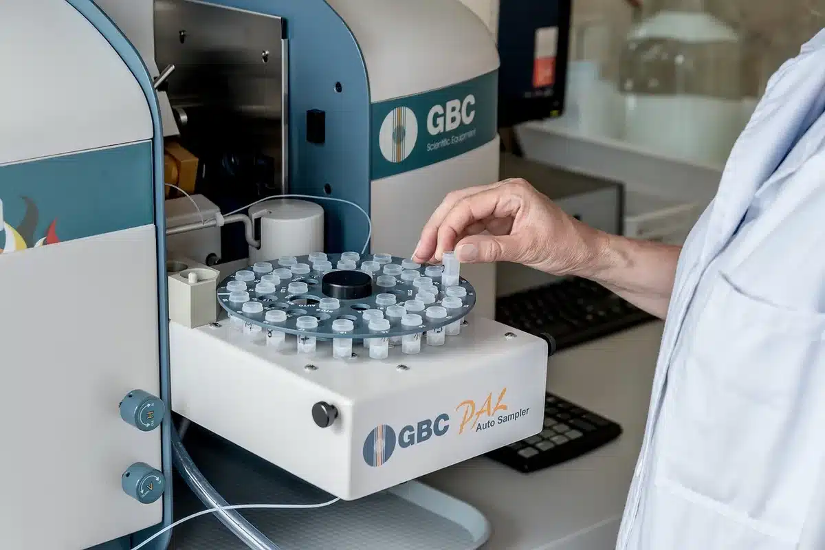 Forensic analyst examining documents in a lab