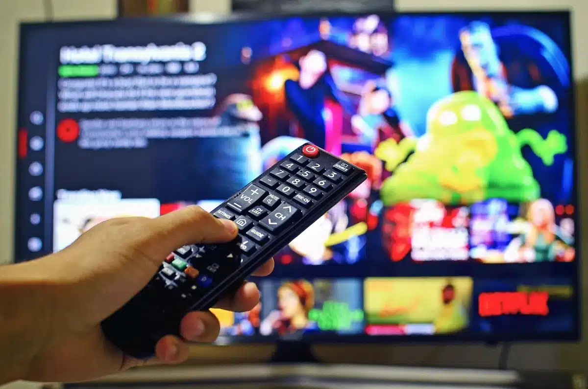 TV showing live basketball game with streaming apps visible