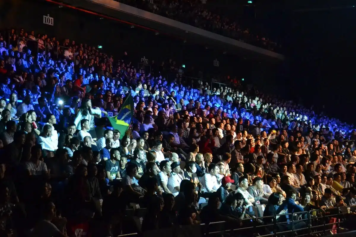 Anonymous crowd cheering at a basketball game